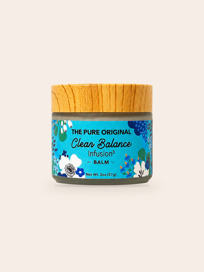 Clear Balance Balm: frosted glass jar, wood-grain lid, turquoise floral label reading Clear Balance in script