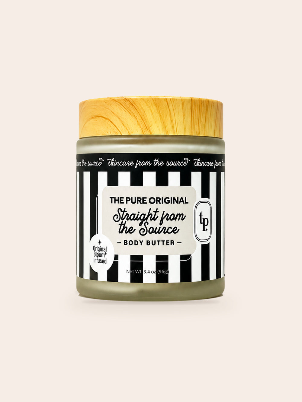 Straight from the Source body butter: frosted jar, wood-grain lid, black and white striped label