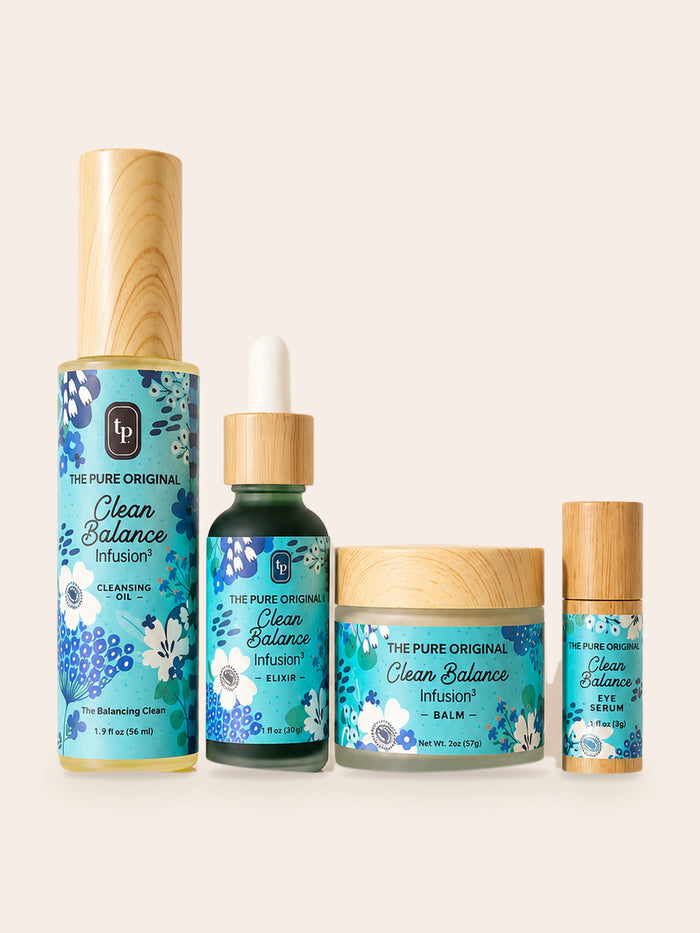 Clear Balance Collection: cleansing oil, elixir, balm jar and eye serum in a row, turquoise labels